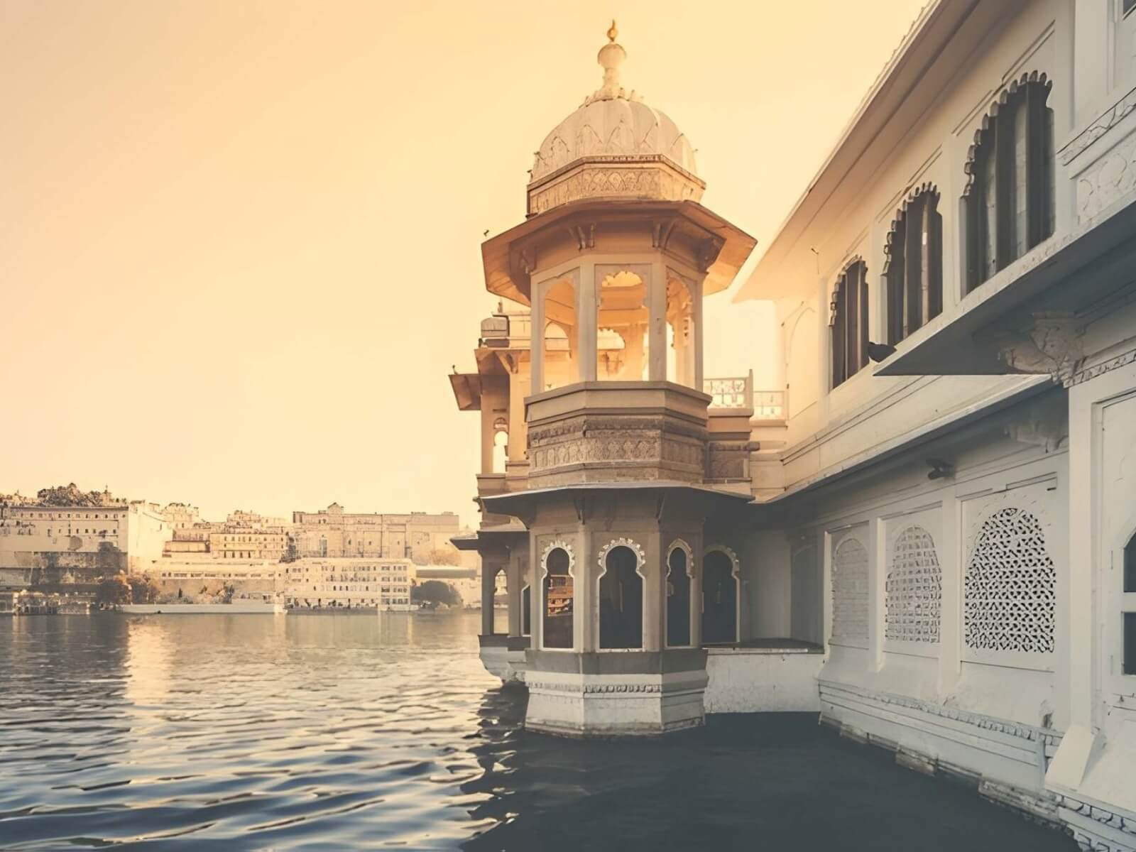Historic palace architecture beside Lake Pichola in Udaipur Rajasthan